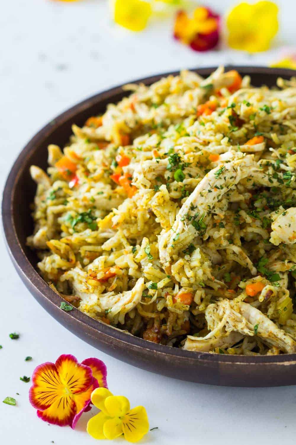 Chicken and rice is the perfect comfort food all year round! Make it entirely in the Instant Pot to save on dishes! Quick, easy, nutritious and delicious!