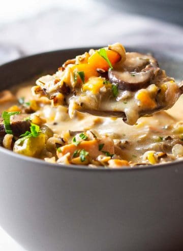 Instant Pot Chicken Wild Rice Soup served in a grey bowl.