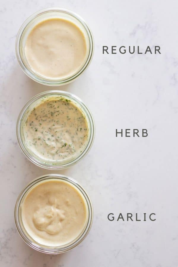 Homemade mayonnaise is a quick condiment that can be made with typical pantry items. This recipe makes mayo that is fresher than anything you can buy from a store! Regular homemade mayonnaise, herb mayonnaise, garlic mayonnaise in jars